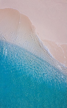 picture of shore transition from sand to blue